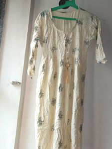This Is A cream Colour Straight Kurta