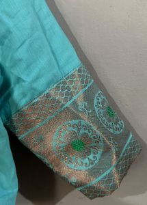 Aqua Blue Saree With Pink Little
