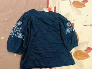 Blue Top With Tag