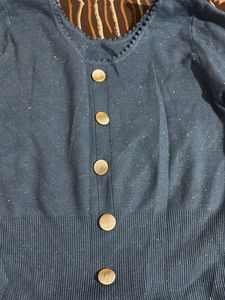 Blue long sleeve knit top