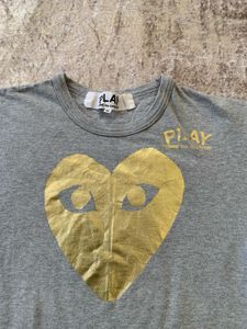 Cdg play big heart logo