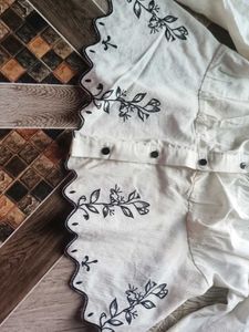 Embroidered Peplum Top