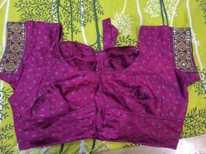 Megenta rajasthani tie-dye saree with bow blouse