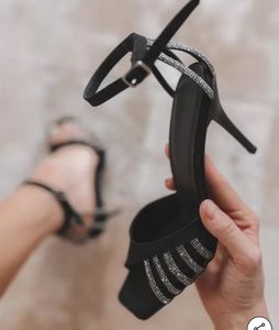 Love in black shimmer strap heels