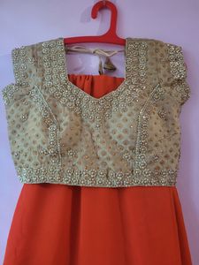 Orange Georgette Saree With 2  Worked Gold Blouse