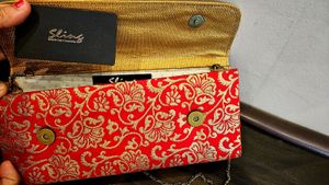 Womens Party Wear Red Sling Clutch from Pantaloons