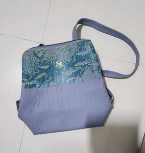 Baggit Textured Blue Backpack Bag