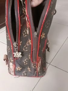 LV Brown Leather Small Backpack cum hand bag...