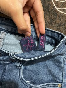 Blue mid waist Denim Jeans.pair up with boots