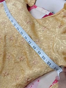 Elegant golden colour Indian suit