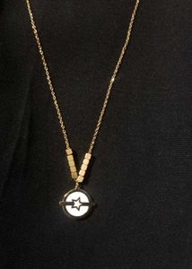 Gold Tone Floral Pendant Necklace