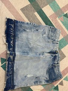 Distressed Denim Mini Skirt