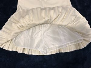 Pleated Mini Skirt with Bow Detail