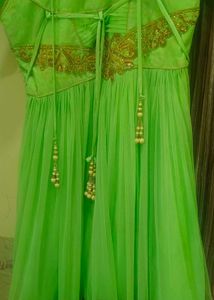 Elegant Green Embroidered Dress with Gold Detailin