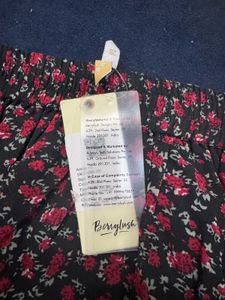 Floral Print Mini Skirt with brand tag