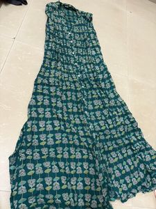 beautiful teal-colored piece adorned with a subtle