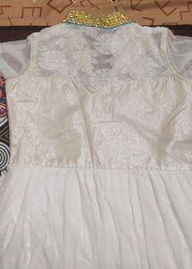 Beautiful Off White Gown With Two Tone Net Fabric
