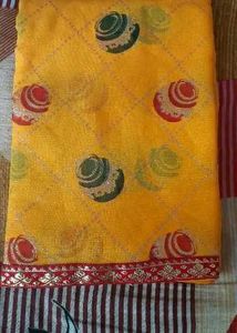 Yellow colored Matka Georgette Saree