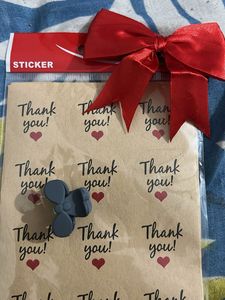 a pack of 5(60) thankyou stickers , bow and cluter