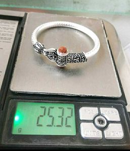 Silver Bracelet with Rudraksha