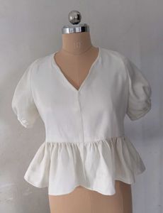 White Peplum Top