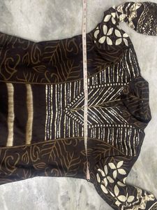 Brown 40 size Kurti with sequence work on neck