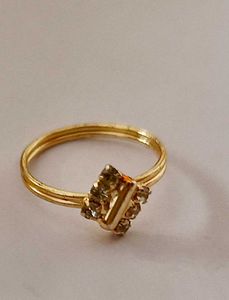 Gold Rings with Gemstone Details