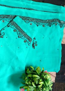 Elegant Turquoise Embroidered Saree