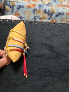 Set Of Four Guruji Thread Bracelets With Cushion