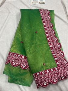 Elegant Green Saree with Border Detail