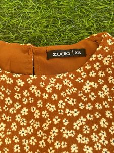 It Is A Brown Dress