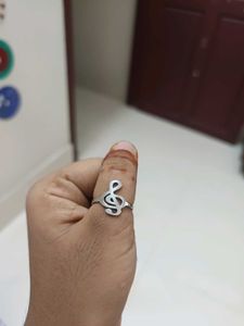 a silver coated music ring.