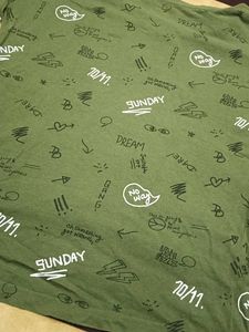 An Olive Coloured Top with Typography