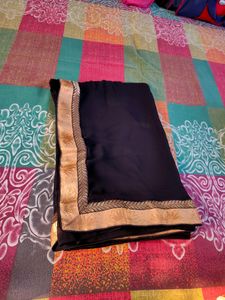 Pure Georgette black saree with lace