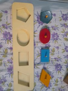 Wooden Knob And Peg Puzzle For Shapes