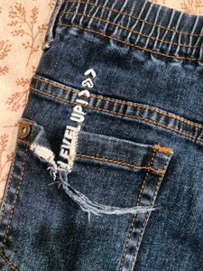Denim Jeans little flaw in one pocket backsi