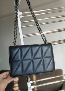 Black sling bag.