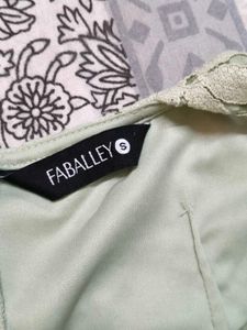 Faballey Green Lace Strappy Belted Peplum Top