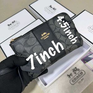 COACH Small Wristlet in Signature Canvas WD BOX