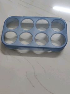 Ice cube maker and egg setter