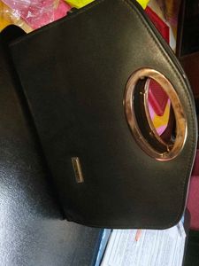 Black Handbag with Gold Handle