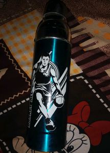 Water Bottle And A Stainless Steel Tiffin Box
