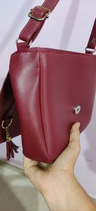 Adjustable sling handbag