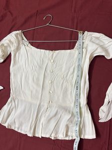 Elegant White Peplum Top