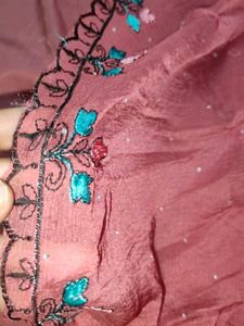 Unstitched Embroidered Dress Materials