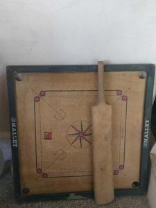 Carrom Board with Cricket Bat