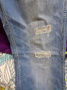 Distressed Denim Jeans