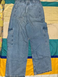 light blue colour shirt with a laces in back side