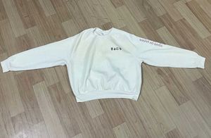 Cream Cropped Sweatshirt.