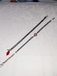 hand .Mangalsutra Chains